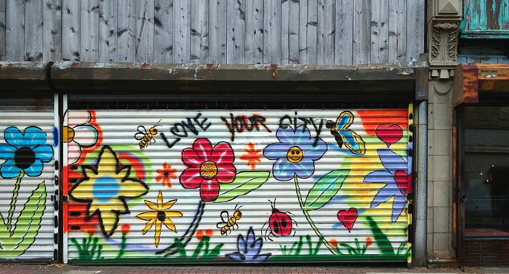 storefront wall with graffiti